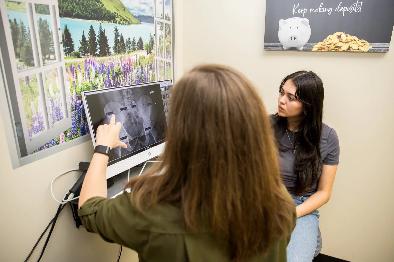 Doctor reviewing care with a fertility patient in natural light